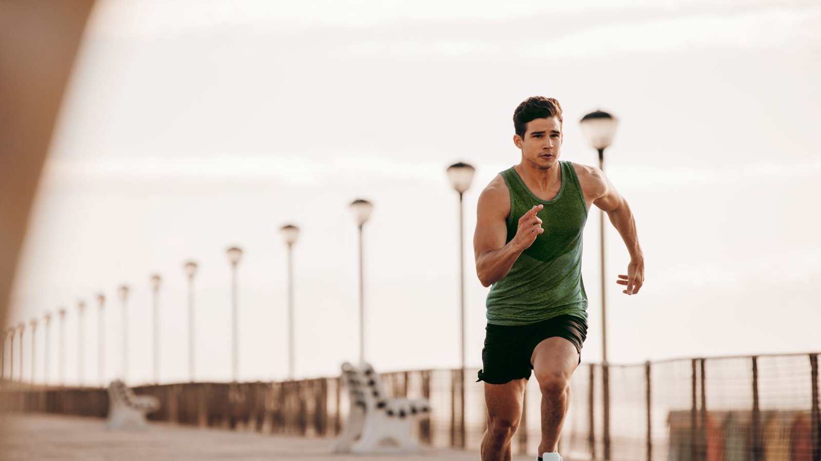 Male athlete running outdoors representing TheraFascia fascia therapy solutions for improved mobility and faster recovery