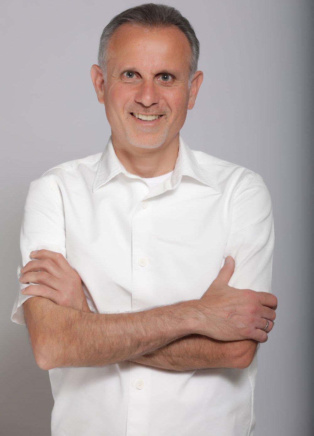 Portrait of Dr. Ismail Bustany, Co-Founder and CTO of TheraFascia, with biography describing his expertise in AI, hardware–software codesign, and fascia therapy innovation.